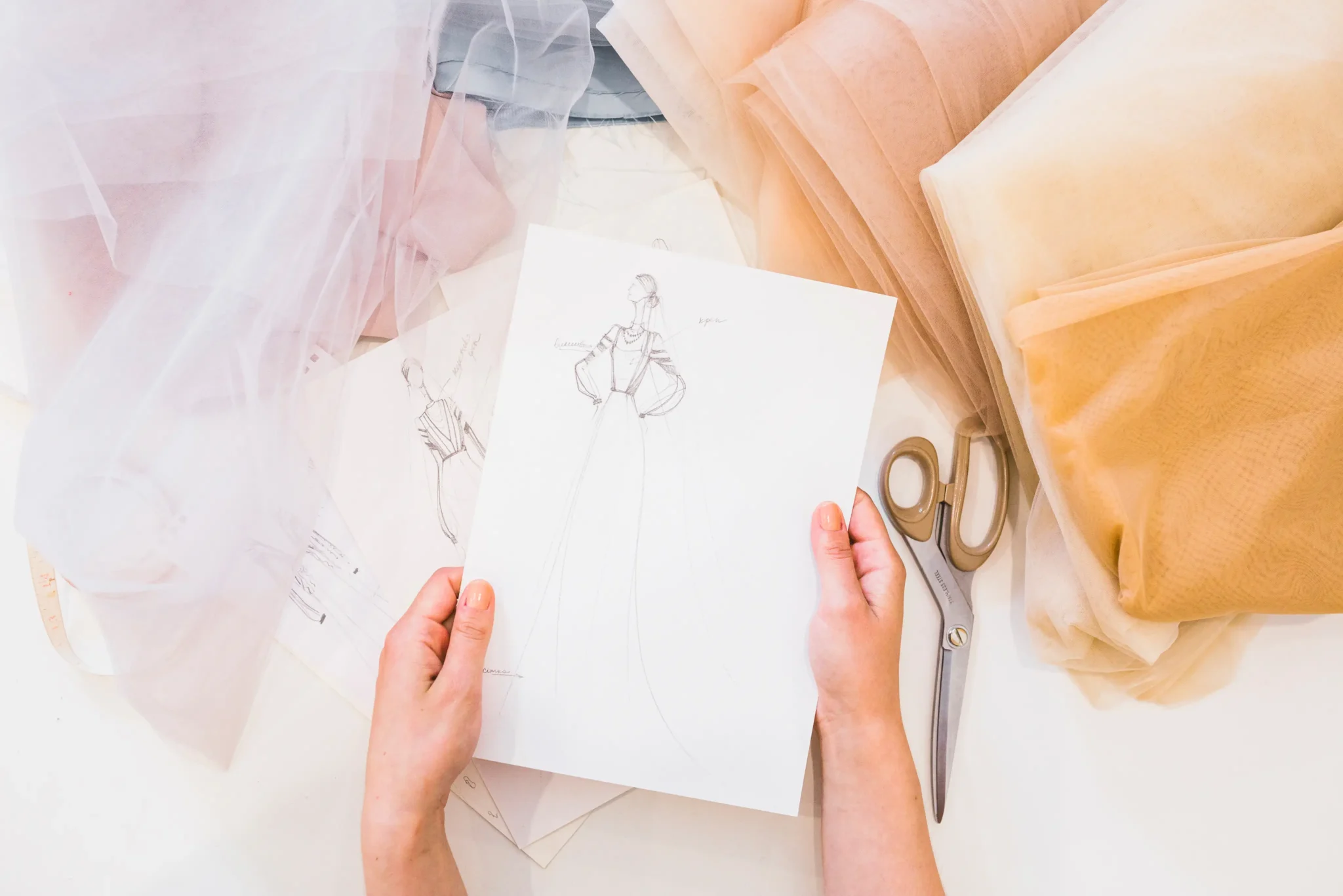 Anisa Bridal Studio fabrics and sketches